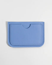 Load image into Gallery viewer, the Small Hours Leather Card Case in Sky Blue laying flat on a white background