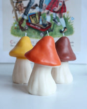 Load image into Gallery viewer, the Drop Dead Retro Mushroom Candle in yellow, orange and brown