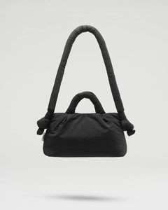 the Ölend Mini Ona Soft Bag in black floating against a neutral background