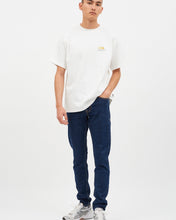 Load image into Gallery viewer, the Dr. Denim Men's Clark Jean in Rubble on a model posing in front of a neutral background with his hand in his left pocket