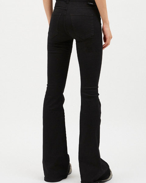 close up of the back view of the Dr. Denim Women's Macy Jean in Black on a model standing in front of a neutral background