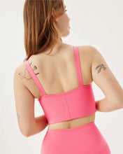Load image into Gallery viewer, back of the Girlfriend Collective Mia Bra in Camellia on a model