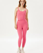 Load image into Gallery viewer, the Girlfriend Collective High-Rise Crop Legging in Camellia worn by a model