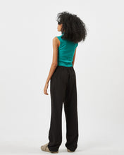 Load image into Gallery viewer, back view of the Minimum Women&#39;s Mokka Top in Bayou on a model standing on a slight angle
