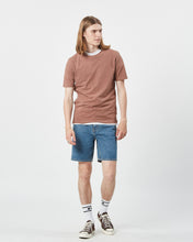 Load image into Gallery viewer, the Minimum Men's Sims T-Shirt in Clove on a model standing looking to one side