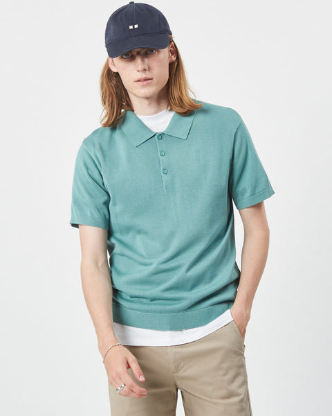 the Minimum Men's Cavli Polo in Oil Blue on a model