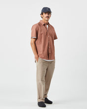 Load image into Gallery viewer, the Minimum Men's Eric Shirt in Clove on a model posing with his hands in his pocket
