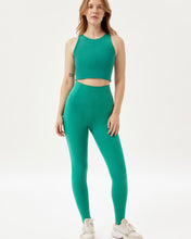 Load image into Gallery viewer, Girlfriend Collective High-Rise Legging in Saguaro on a model