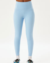 Load image into Gallery viewer, close up of model wearing the Girlfriend Collective High-Rise Crop Legging in Cerulean
