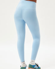 Load image into Gallery viewer, back view of the Girlfriend Collective High-Rise Crop Legging in Cerulean on a model