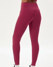 Load image into Gallery viewer, back view of the Girlfriend Collective Ultralight Legging in Rhododendron on a model