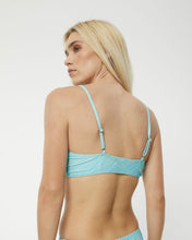 Load image into Gallery viewer, a close up of the Afends Adi Bikini Top in Blue Stripe on a model posing looking over her left shoulder
