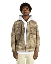 Load image into Gallery viewer, the Taikan Shirt Jacket in Abstract Camo on a model worn open over a hoodie
