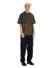 Load image into Gallery viewer, the Taikan Patchwork Shirt in Olive Plaid on a model
