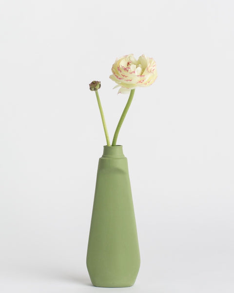 Middle Kingdom Lotion Bottle Vase with a flower