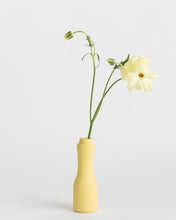 Load image into Gallery viewer, Middle Kingdom Drinkable Yogurt Bottle Vase in butter with a yellow flower
