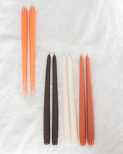 Load image into Gallery viewer, four pairs of Socco Designs Taper Candles laying flat on a white sheet