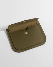 Load image into Gallery viewer, the Small Hours Leather Mini Wallet in Olive laying on a white background on an angle with the front snap pocket open
