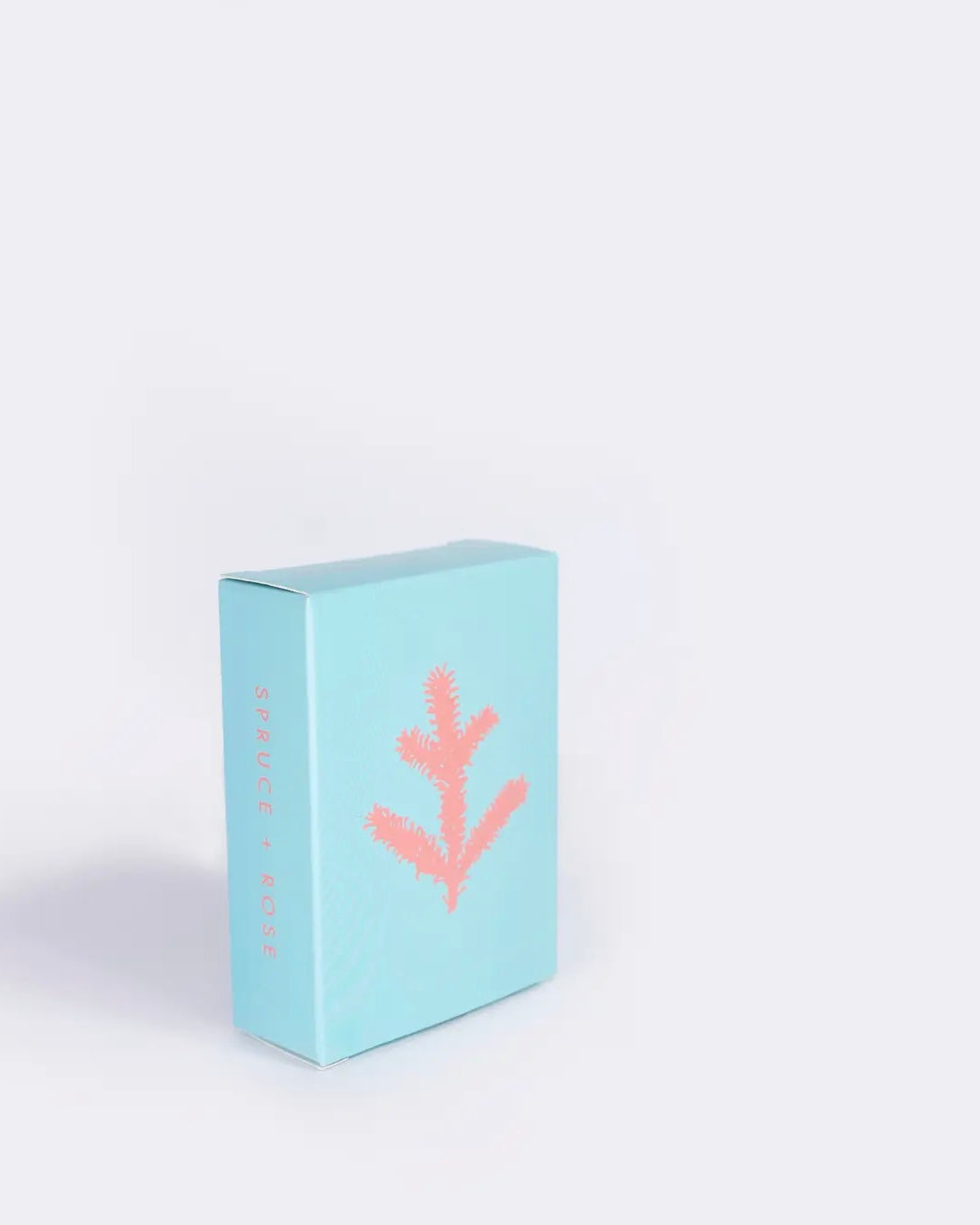 the ALTR Spruce & Rose Bar Soap in it's box against a neutral background