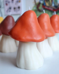 close up of the orange Drop Dead Retro Mushroom Candle