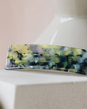 Load image into Gallery viewer, a close up of the Horace Tara Hair Clip in turquoise and blue resting on a white angular surface
