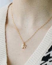 Load image into Gallery viewer, a close up shot of the Horace Filoro Necklace worn by a model wearing a v neck sweater 
