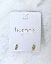 Load image into Gallery viewer, the Horace Gemma Stud Earring in gold on a branded card laying on a marble surface
