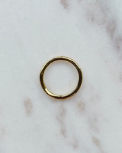 Load image into Gallery viewer, Horace Wavy Ring in gold shot from above laying flat on a marble surface
