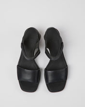Load image into Gallery viewer, overheard shot of the Camper Women&#39;s Kiara Sandal in Black sitting against a neutral background
