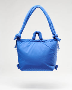 the Ölend Ona Soft Bag in cobalt blue floating against a neutral background