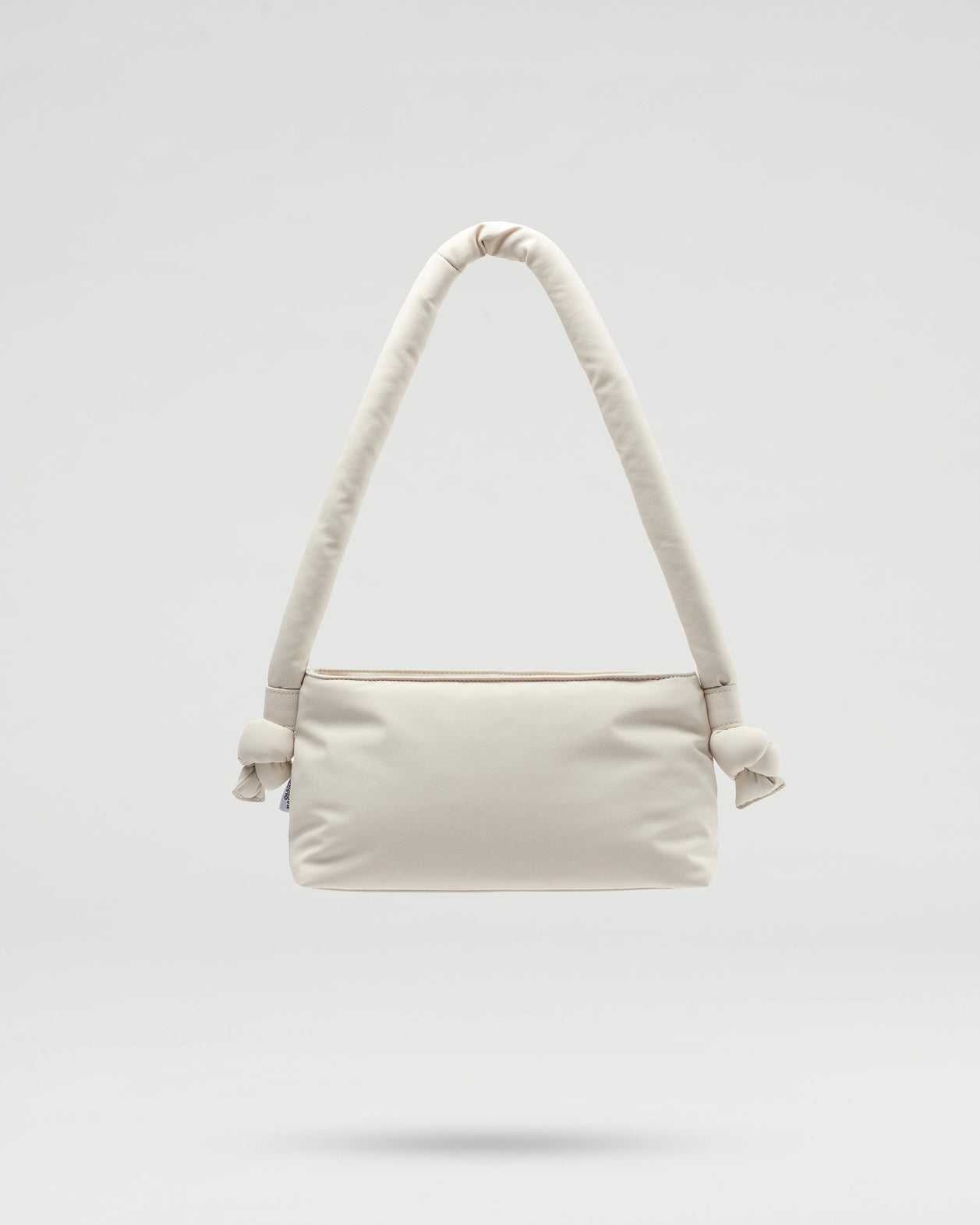 the Ölend Taco Bag in sand floating against a neutral background