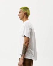 Load image into Gallery viewer, side view of the the Afends Men&#39;s Classic Hemp Retro Tee in White on a model posing in front of a white background
