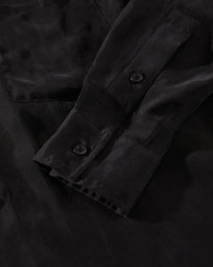 close up of the Afends Women's Gemma Shirt in Black sleeve detail