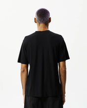 Load image into Gallery viewer, back view of the Afends Men&#39;s Classic Hemp Retro Tee in Black on a model posing in front of a white background
