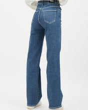 Load image into Gallery viewer, close up back view of the Dr. Denim Women&#39;s Moxy Jean in Cape on a model standing in front of a neutral background
