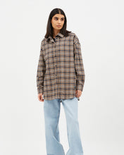 Load image into Gallery viewer, the Dr. Denim Women&#39;s Molly Shirt in Ocean Check on a model standing in front of a neutral background looking off to the side
