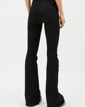 Load image into Gallery viewer, close up of the back view of the Dr. Denim Women&#39;s Macy Jean in Black on a model standing in front of a neutral background
