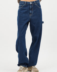 close up of the front of the Dr. Denim Women's Faye Jean in Pebble on a model posing in front of a neutral background