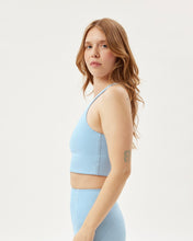 Load image into Gallery viewer, side view of the Girlfriend Collective Paloma Bra in Cerulean on a model
