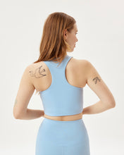 Load image into Gallery viewer, back view of the Girlfriend Collective Paloma Bra in Cerulean on a model
