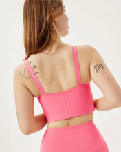 Load image into Gallery viewer, back of the Girlfriend Collective Mia Bra in Camellia on a model
