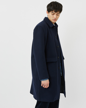 Load image into Gallery viewer, Side view of Minimum Men&#39;s Balano Coat in Navy Blazer on model

