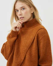 Load image into Gallery viewer, close up of a model wearing the Minimum Women&#39;s Meline Sweater in Roasted Pecan posing with her hand on her chin
