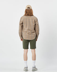 back view of the Minimum Men's Woad Overshirt in Brown Sugar on a model