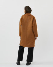 Load image into Gallery viewer, back view of model standing in the Minimum Women&#39;s Gutha Jacket in Roasted Pecan
