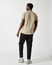 Load image into Gallery viewer, back view of the Minimum Men&#39;s Zane Polo in Seneca Rock on a model

