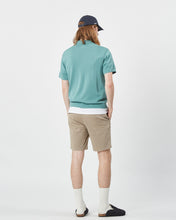 Load image into Gallery viewer, back view of the Minimum Men&#39;s Cavli Polo in Oil Blue on a model
