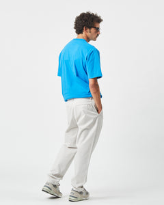 back view of the Minimum Men's Bertils Pant in Vapor Blue on a model