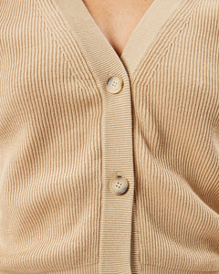 close up of the Minimum Women's Cardine Cardigan in Safari buttons on a model