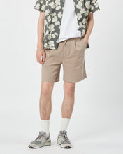 Load image into Gallery viewer, front view of the Minimum Men&#39;s Bratto Pant in Greige on a model
